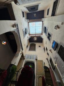 TV a/nebo společenská místnost v ubytování Le panoramique de Fes