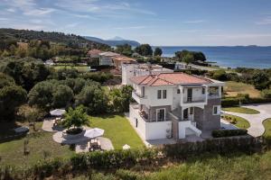 an aerial view of a house with the ocean at Casa al Mare in Nea Roda