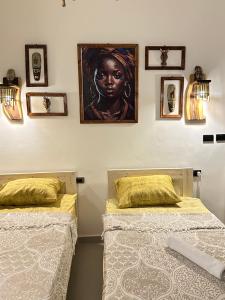 Postel nebo postele na pokoji v ubytování Noah House Dahab