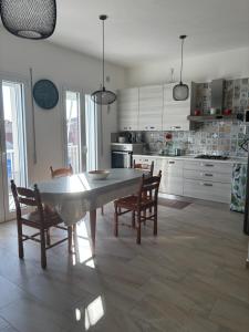 Kuchyň nebo kuchyňský kout v ubytování Andrea's Home