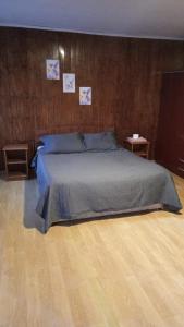 Postel nebo postele na pokoji v ubytování Hostal Fx