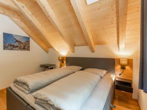 Ein Bett oder Betten in einem Zimmer der Unterkunft Haus Ganbei