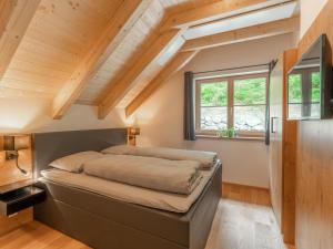 Ein Bett oder Betten in einem Zimmer der Unterkunft Haus Ganbei