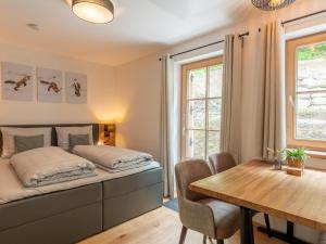 Ein Bett oder Betten in einem Zimmer der Unterkunft Haus Ganbei