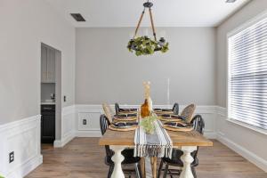 a dining room with a table and chairs at Private Room in Ballantyne in Charlotte