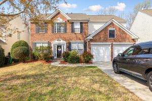 a house with a car parked in front of it at Private Room in Ballantyne in Charlotte