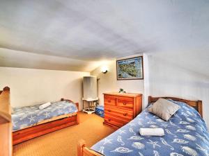 Ένα ή περισσότερα κρεβάτια σε δωμάτιο στο Apartment Les Terrasses 3 by Interhome
