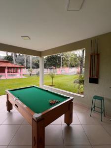 Τραπέζι μπιλιάρδου στο Chácara Oásis Araçariguama, Natureza, Piscina Incrível e Sossego