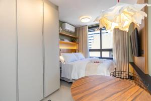 Postel nebo postele na pokoji v ubytování Studio Moderno e Aconchegante no All Batel-BAT0721 + 123 fotografií