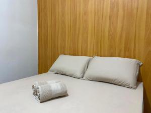 Ένα ή περισσότερα κρεβάτια σε δωμάτιο στο Casinha aconchegante no Vale do Ribeira