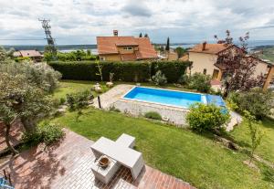 an aerial view of a backyard with a swimming pool at Apartments Novka in Izola