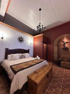 Postel nebo postele na pokoji v ubytování Copa de Oro Hotel Boutique