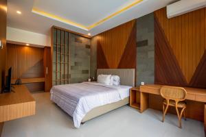 Postel nebo postele na pokoji v ubytování Villa Hua Wu Fei Yan + 26 fotografií