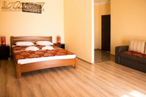 Posteľ alebo postele v izbe v ubytovaní Sting Hotel & Event Palace