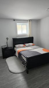 Ένα ή περισσότερα κρεβάτια σε δωμάτιο στο Appartement Moderne et Équipé +30 φωτογραφίες