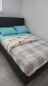 Ένα ή περισσότερα κρεβάτια σε δωμάτιο στο Appartement Moderne et Équipé