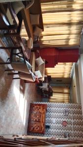 an overhead view of a room with a ceiling at Quaint stays - By the river beas in Haripūr