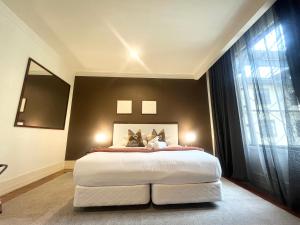Ένα ή περισσότερα κρεβάτια σε δωμάτιο στο Charming Studio Apartment in Auckland Central