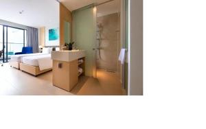 Кровать или кровати в номере Tropical Beach Dream of Resort Cam Ranh