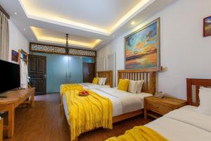 Postel nebo postele na pokoji v ubytování Yueju Designer Homestay