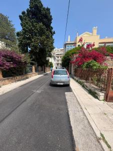 a car parked on the side of a street at SMYRNA HOMES CHiOS ERATO in Chios