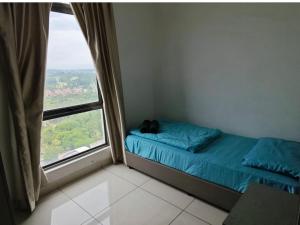 a bedroom with a bed and a large window at Evo Duplex Bangi, WIFI in Bandar Baru Bangi +4 photos