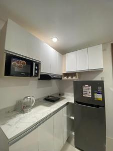 Η κουζίνα ή μικρή κουζίνα στο Unit 514 at One Pontefino Tower +7 φωτογραφίες