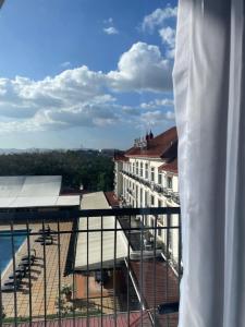a view from the balcony of a building with a pool at Condominium Unit at One Pontefino Tower in Batangas City