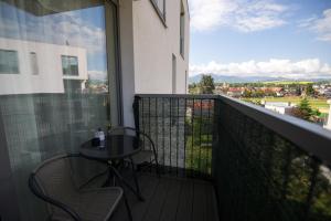 Balkón nebo terasa v ubytování New Cosy Apartment, close to TATRALANDIA and JASNA, parking
