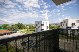 Balkón nebo terasa v ubytování New Cosy Apartment, close to TATRALANDIA and JASNA, parking