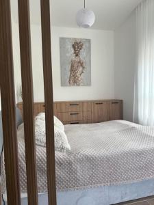 Postel nebo postele na pokoji v ubytování POOL RESORT- Vila Lena- Studio 3