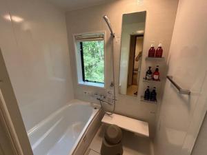 Koupelna v ubytování サンカーサ リバーサイド - 自然の中で暖をとる冬の隠れ家