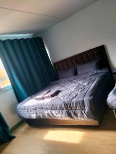 Postel nebo postele na pokoji v ubytování แม่ตังค์ ห้องพักc5