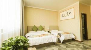 Postel nebo postele na pokoji v ubytování Shell Hotel Wuxi Jiangyin Yungu Road + 61 fotografií