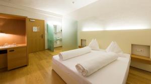 Postel nebo postele na pokoji v ubytování Hotel Goldener Stern
