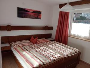 Postel nebo postele na pokoji v ubytování Haus Birgit