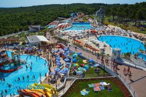 an overhead view of a water park with people in it at Apartments Casa Garibaldi in Brtonigla