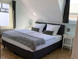 Postel nebo postele na pokoji v ubytování Veojano Ferienwohnung