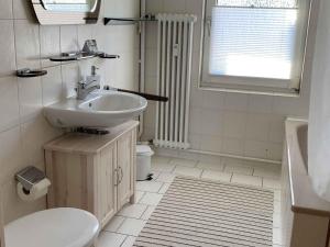 Koupelna v ubytování Veojano Ferienwohnung + 11 fotografií