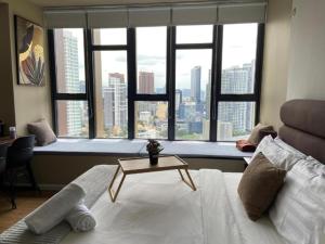 Postel nebo postele na pokoji v ubytování Ceylonz Suites Bukit Bintan By MyStay