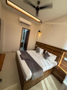 Ένα ή περισσότερα κρεβάτια σε δωμάτιο στο Hotel kartik