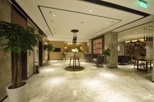 Yitel Collection Hangzhou Binjiang Jiangnan Avenue Baolongcheng的休息区