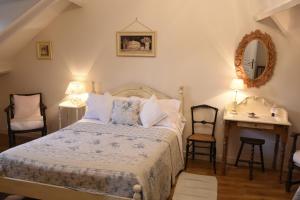 Postel nebo postele na pokoji v ubytování Domaine de la chapelle - Ch d'hote