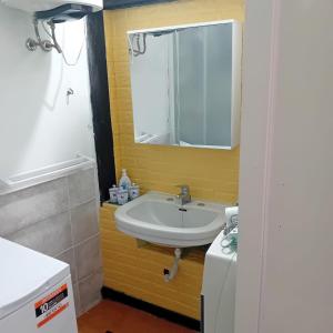 a bathroom with a sink and a mirror at Casa Milanesi in Monterosso al Mare +21 photos