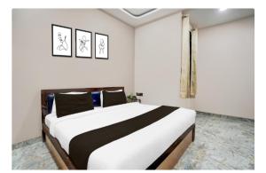 Postel nebo postele na pokoji v ubytování Jai shree shyam guest house