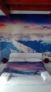 Postel nebo postele na pokoji v ubytování Alloggio turistico Vivaldi