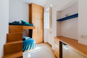 En eller flere senge i et værelse på Dimora storica Torre Matta Otranto