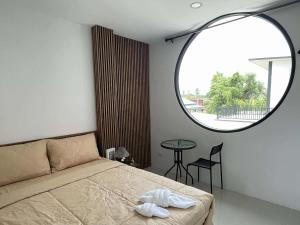 นราพฤกษา อพาร์ทเมนท์客房内的一张或多张床位