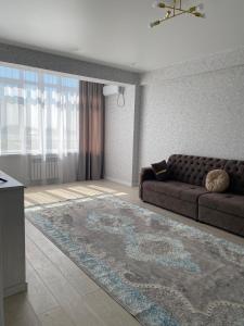 Posezení v ubytování Квартира