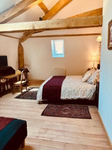 Postel nebo postele na pokoji v ubytování Au cœur de la Citadelle